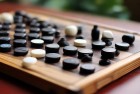五子棋新技巧突破重围：智者推理，经典对局挑战